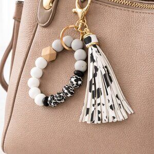 Black & White Cow Print Tassel Beaded Wristlet Keychain with Gold Clasp Neutral
